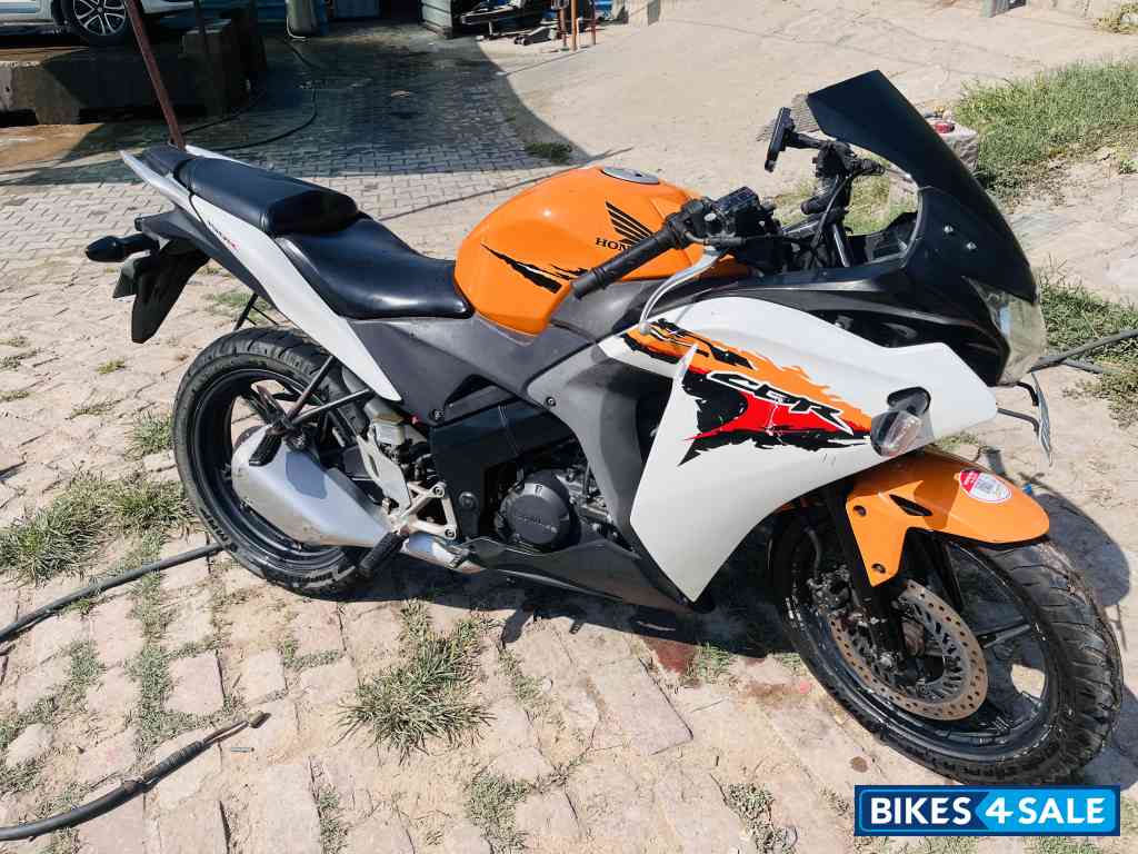 Orange & White Honda CBR 150R Orange & White Honda CBR 150R