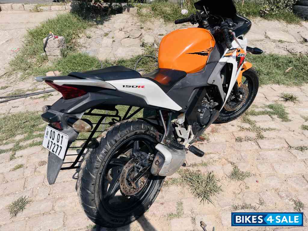 Orange & White Honda CBR 150R Orange & White Honda CBR 150R