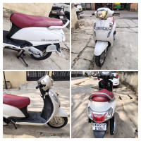 White Suzuki Access 125