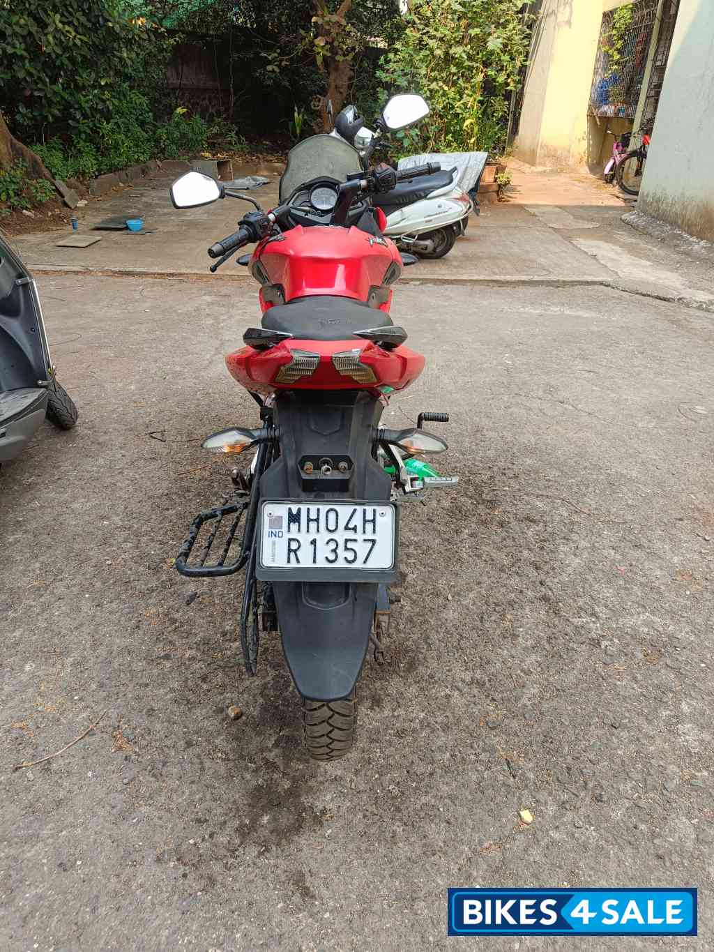 Red Bajaj Pulsar AS 150