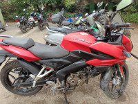 Red Bajaj Pulsar AS 150