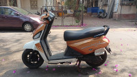 Golden & White Mahindra Gusto 125