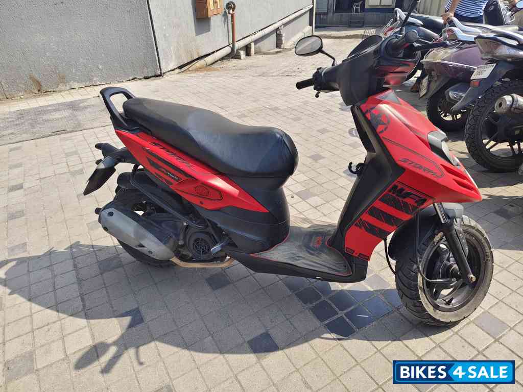 Red Aprilia SR 125