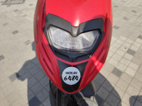 Red Aprilia SR 125