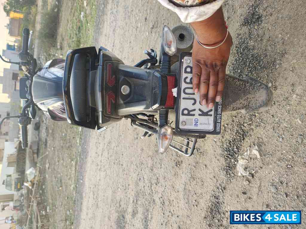 Black TVS Raider 125 Marvel Super Squad Edition