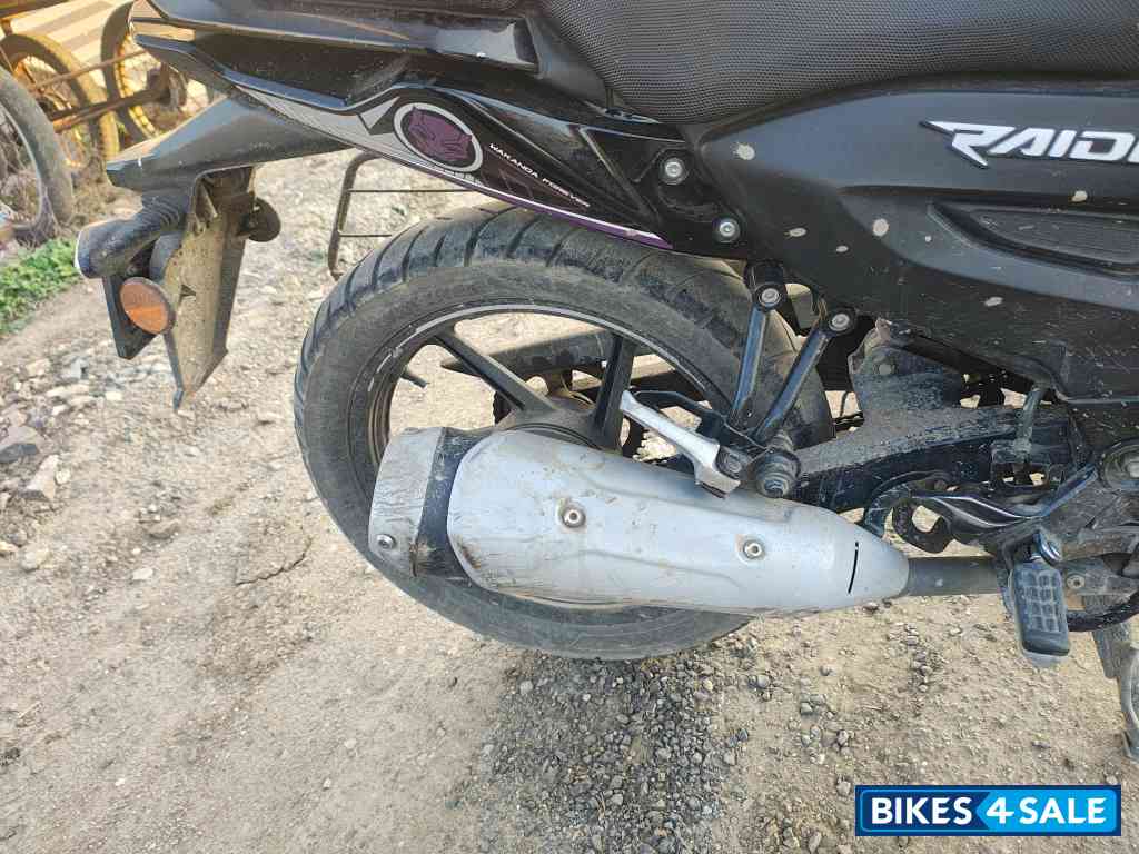 Black TVS Raider 125 Marvel Super Squad Edition