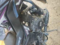 Black TVS Raider 125 Marvel Super Squad Edition