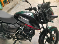 Red Bajaj Pulsar 125 Neon Disc Single Seat