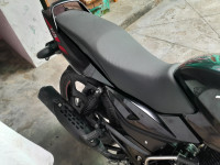 Red Bajaj Pulsar 125 Neon Disc Single Seat