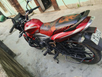 Red Bajaj Discover 125