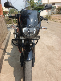 Black And Red Bajaj Pulsar 150 Twin Disc