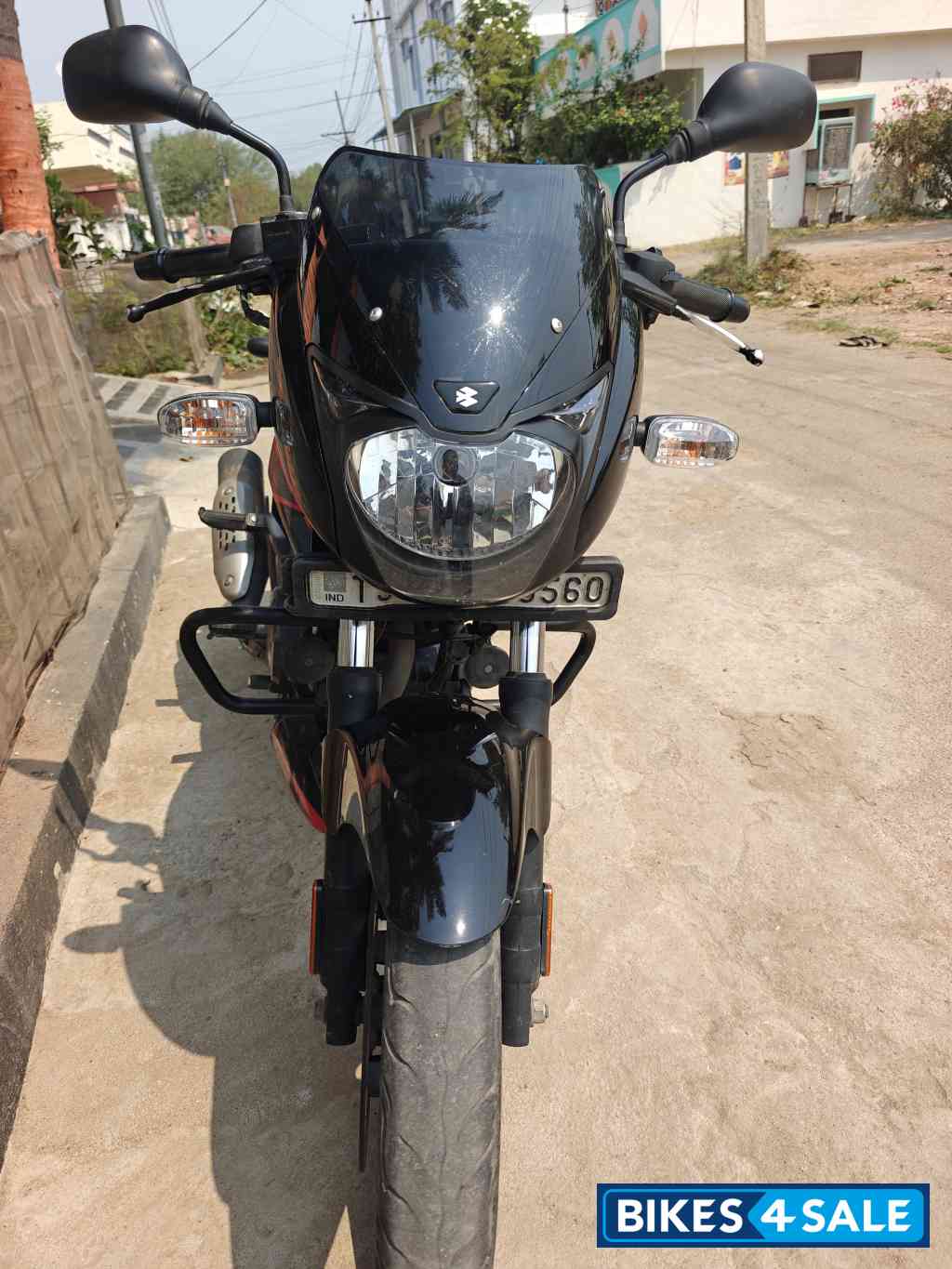 Black And Red Bajaj Pulsar 150 Twin Disc