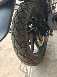 Black And Red Bajaj Pulsar 150 Twin Disc