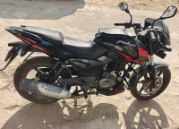 Black And Red Bajaj Pulsar 150 Twin Disc
