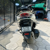 White Suzuki Burgman Street BS6