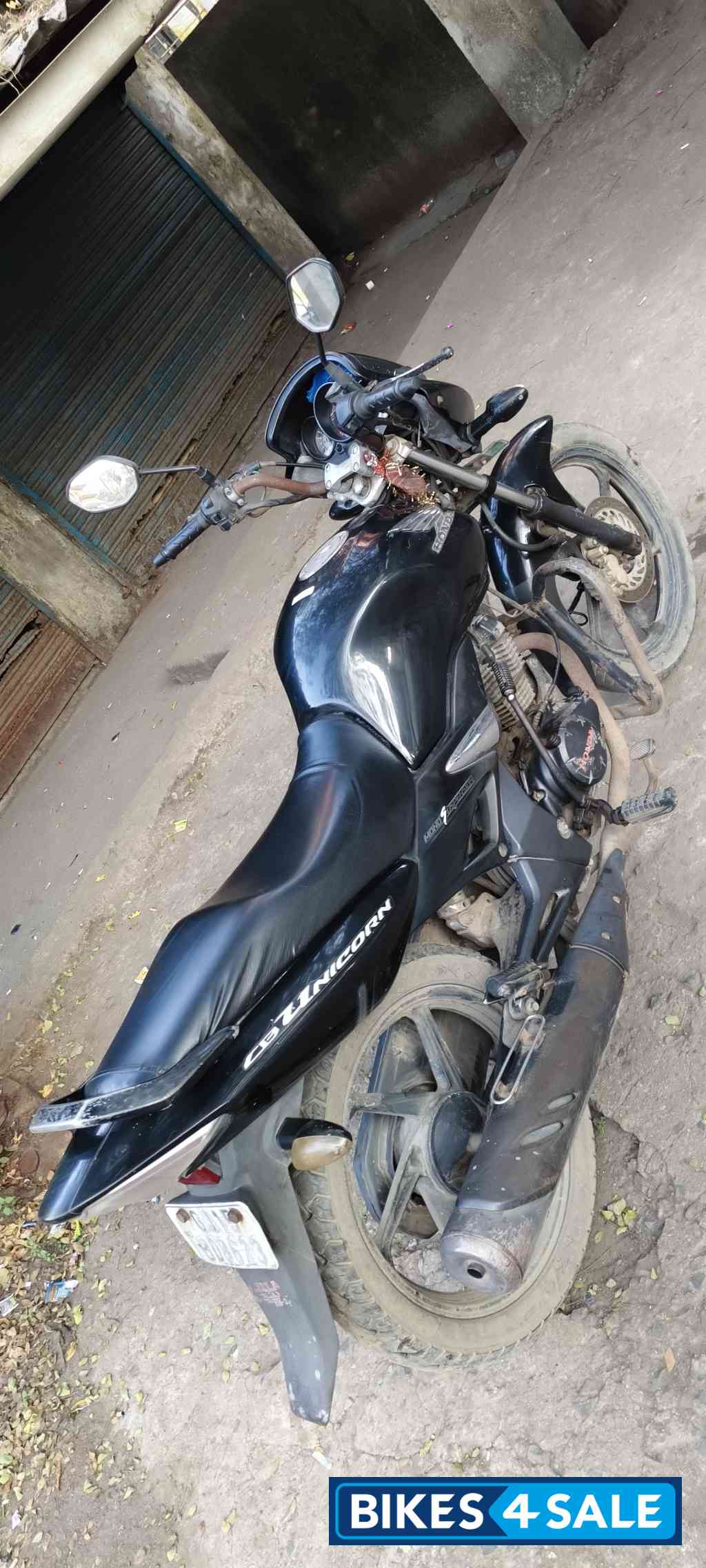Black Honda Unicorn