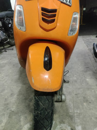 Orange Vespa SXL 125 FL 20