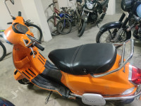 Orange Vespa SXL 125 FL 20