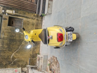Yellow Vespa VXL 125