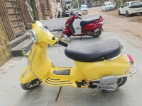 Yellow Vespa VXL 125