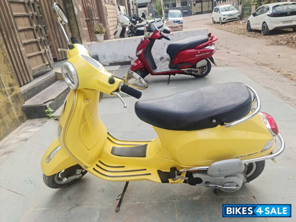 Yellow Vespa VXL 125