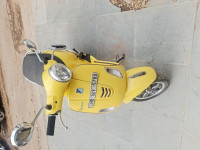 Yellow Vespa VXL 125