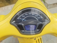 Yellow Vespa VXL 125
