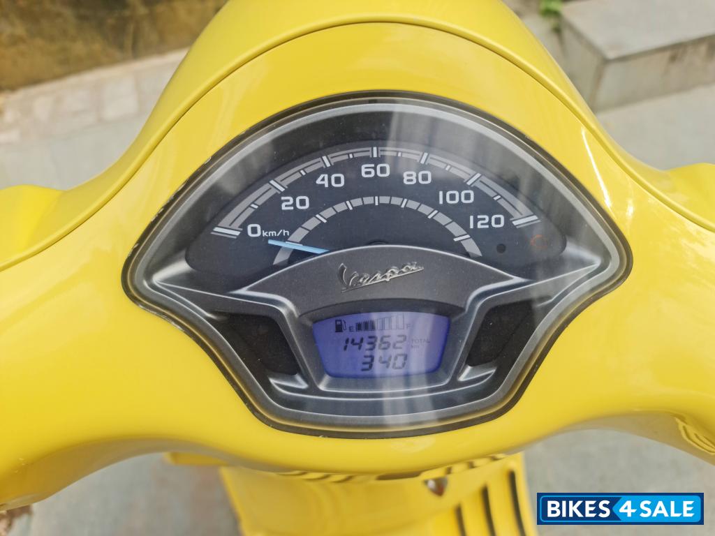 Yellow Vespa VXL 125