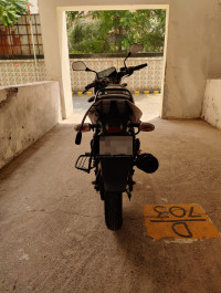 Ebony Black Solar Red Bajaj Pulsar 125 Neon Disc Single Seat