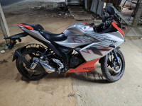 Orange Silver Suzuki Gixxer SF