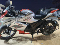 Orange Silver Suzuki Gixxer SF