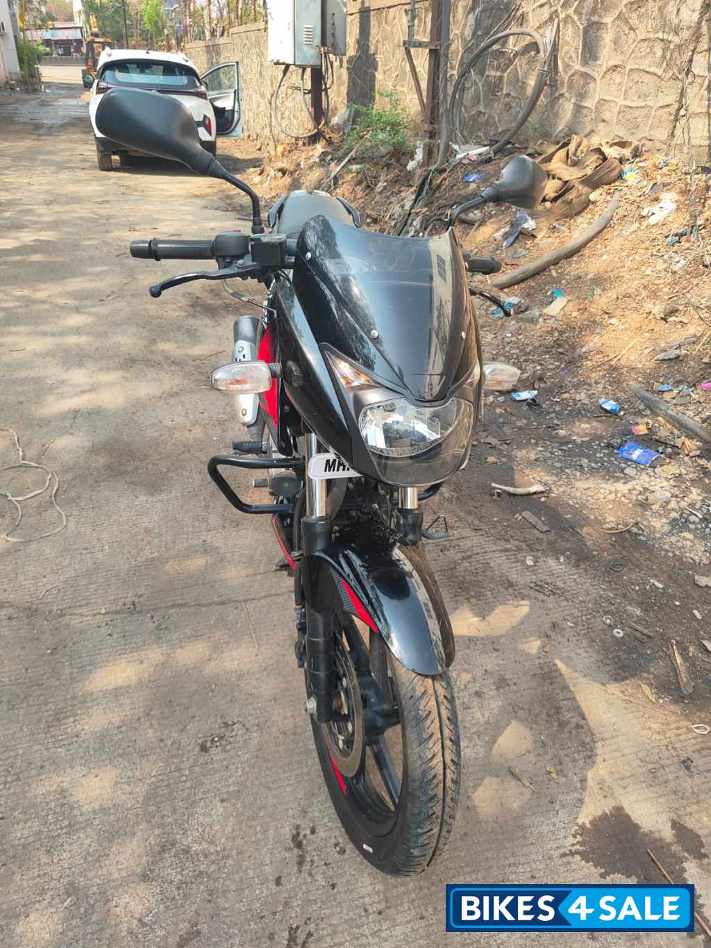 Black And Red Bajaj Pulsar 150