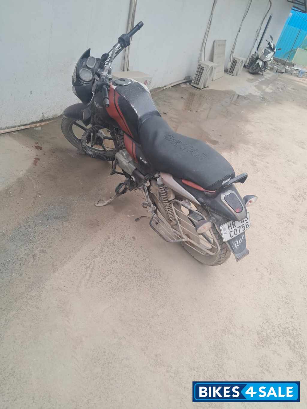 Orange Black Bajaj V12