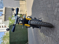 Pearl White Triumph Scrambler 400 X