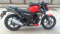 Striking Red TVS Raider