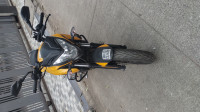 Yellow Bajaj Pulsar 200 NS