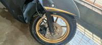 Black -golden Yamaha Fascino S