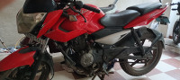 Red Bajaj Pulsar 135LS