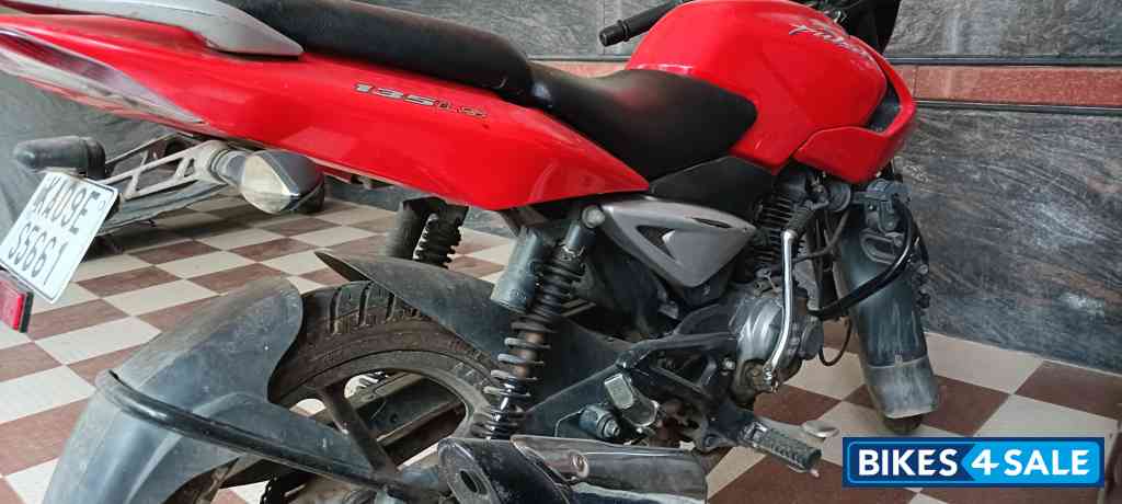 Red Bajaj Pulsar 135LS