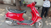 Red Vespa LX 125