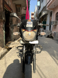 Black-red Bajaj Pulsar 150 Neon