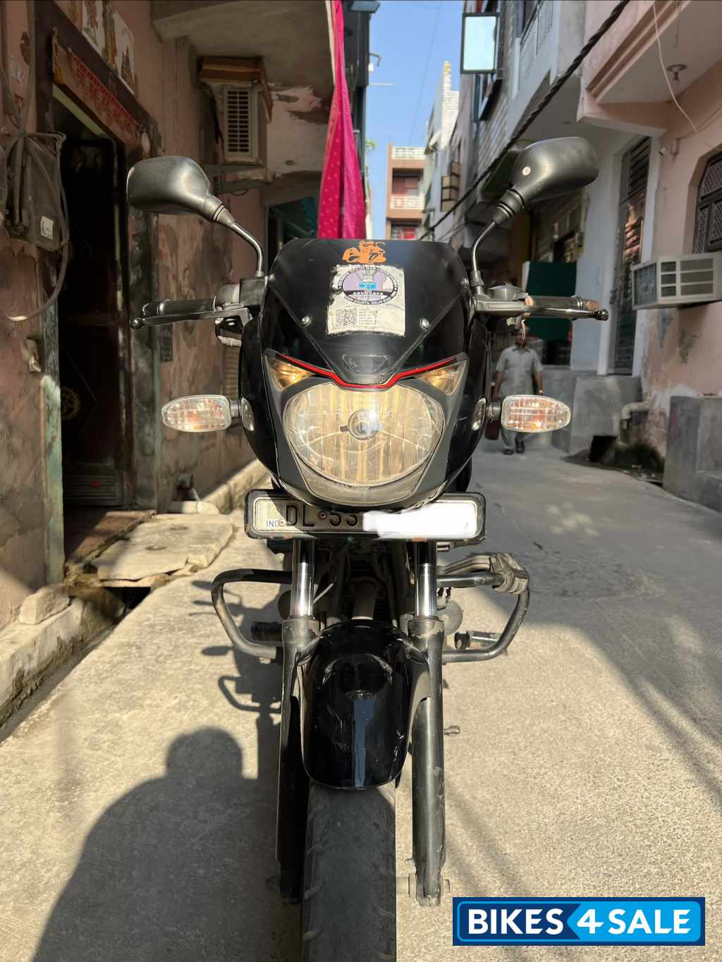 Black-red Bajaj Pulsar 150 Neon