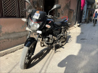 Black-red Bajaj Pulsar 150 Neon