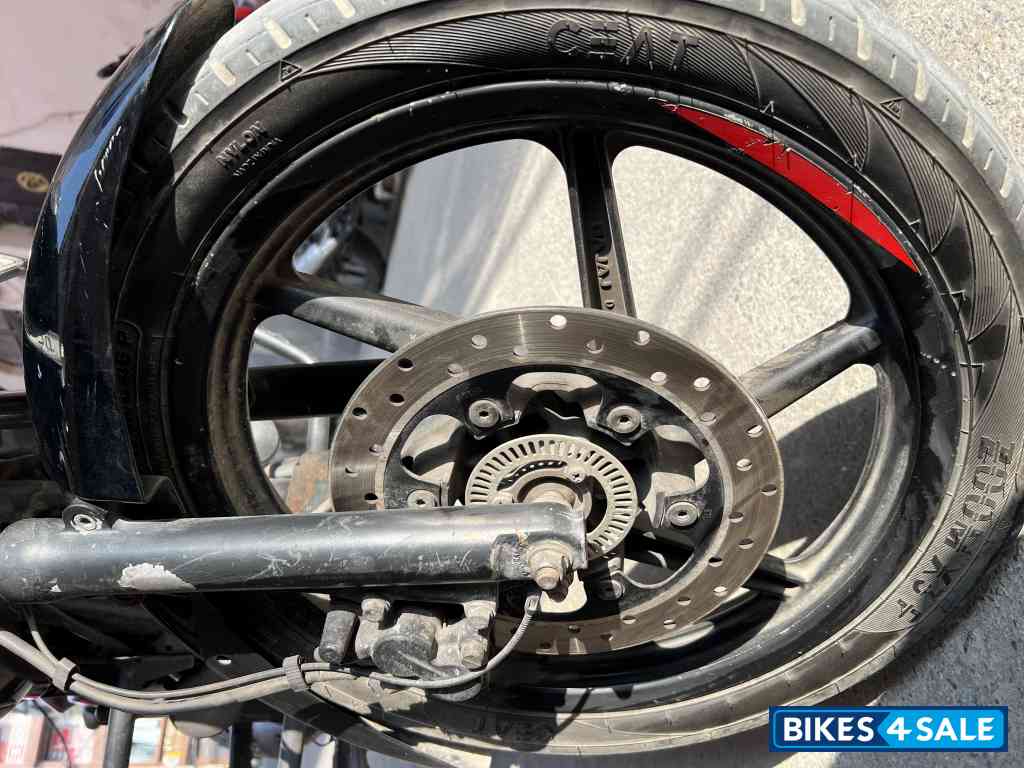 Black-red Bajaj Pulsar 150 Neon