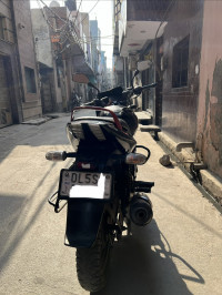 Black-red Bajaj Pulsar 150 Neon