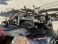 Black-red Bajaj Pulsar 150 Neon
