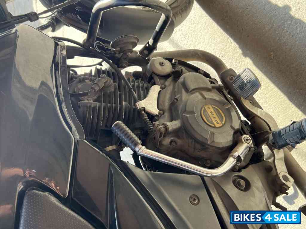 Black-red Bajaj Pulsar 150 Neon