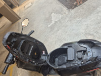 Black Aprilia SR 150