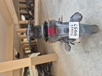 Black Aprilia SR 150