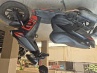 Black Aprilia SR 150